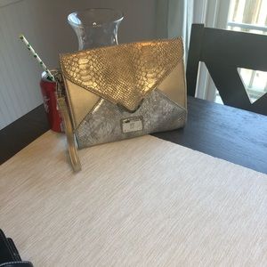 Silver and Gold clutch. NWT NYCo!